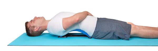 Back Stretcher and Posture Corrector being used by a man