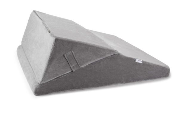 Wedge pillow by slumbar displayed in the highest level of incline.